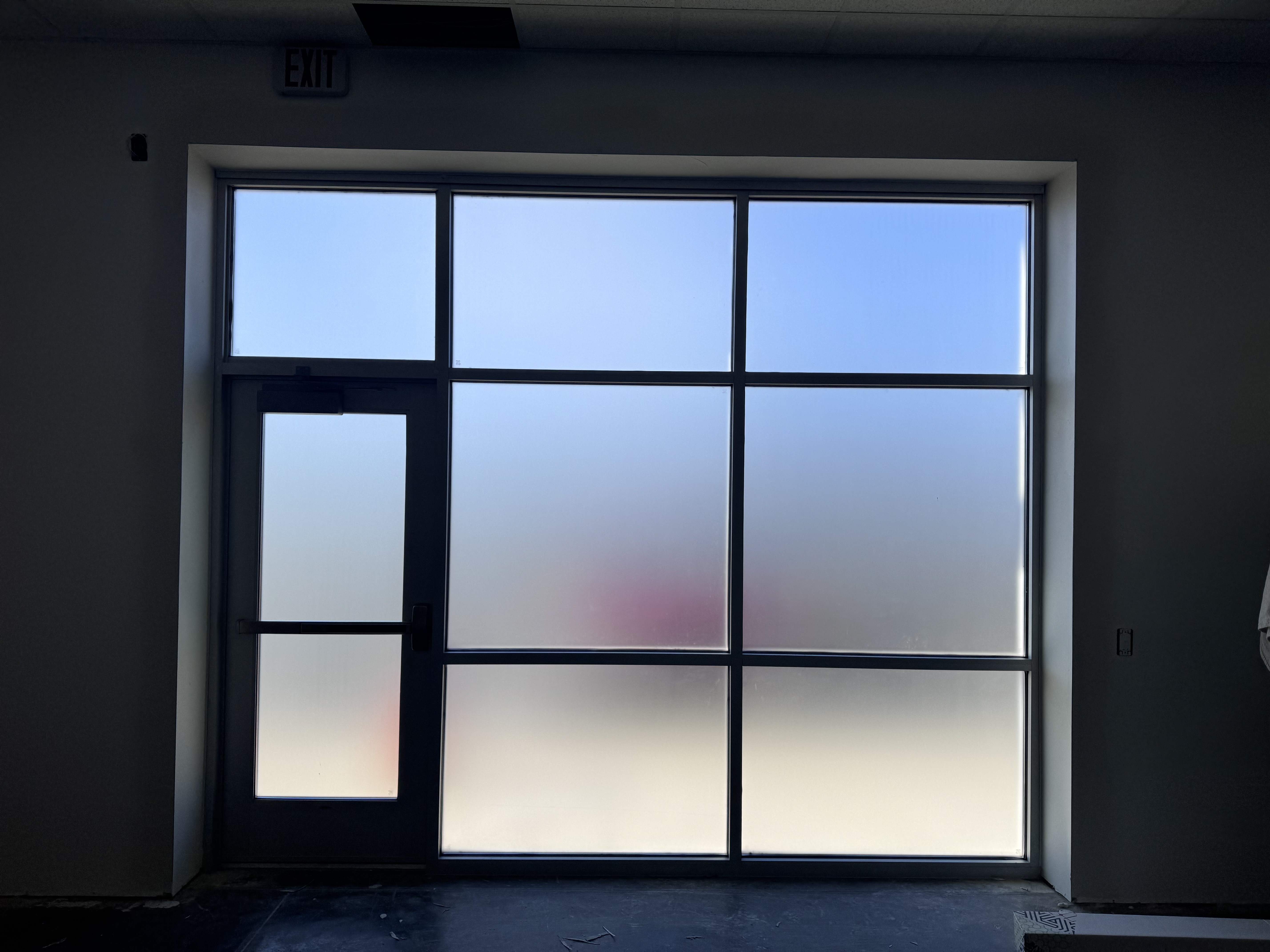 Frosted privacy film on windows and door